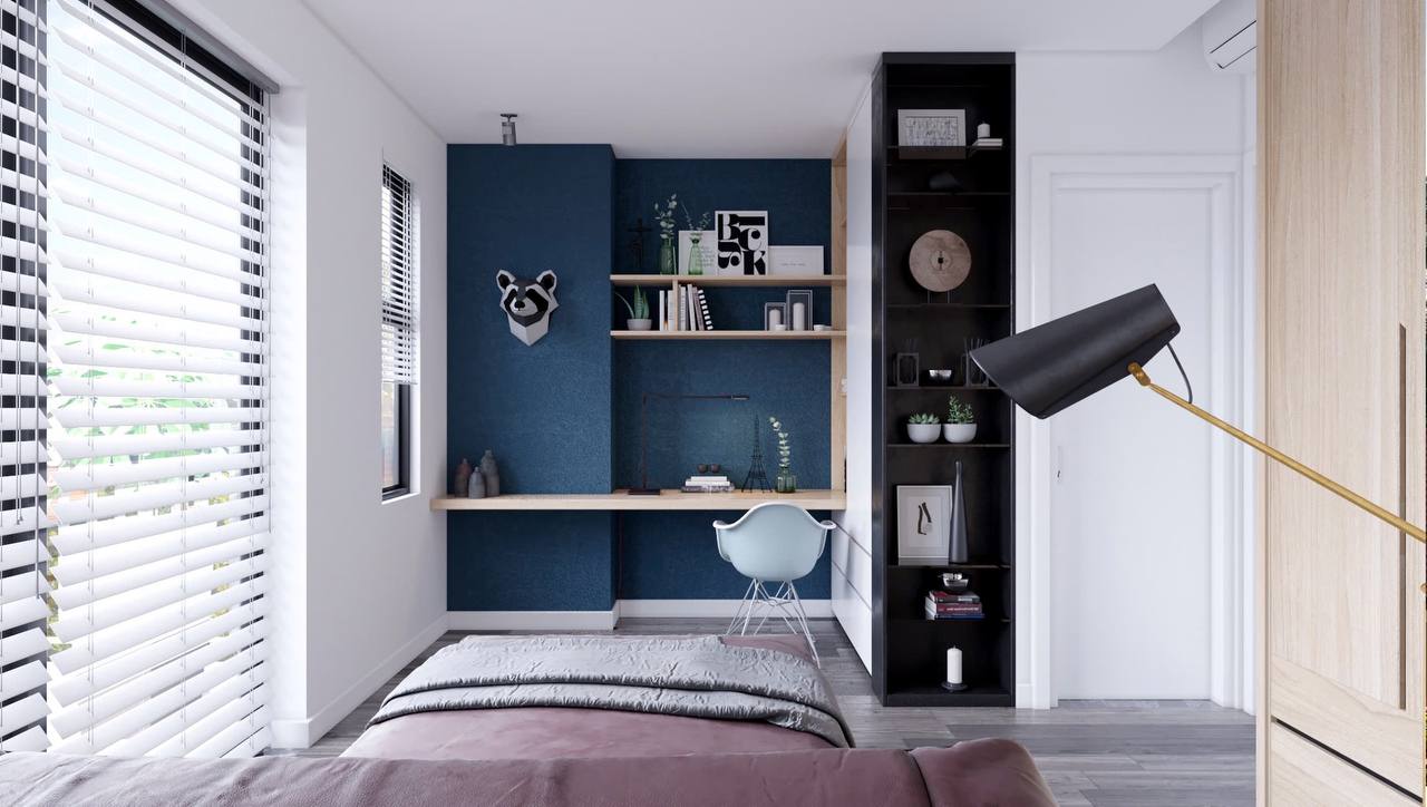 Phòng trẻ em - tường xanh navy, bàn treo tường, trang trí raccoon, kệ sách