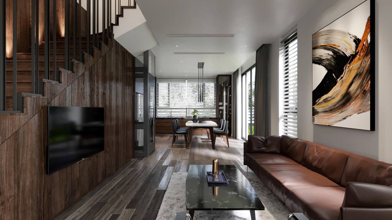 Toàn cảnh phòng khách biệt thự Vinhomes Hải Phòng - sofa da, cầu thang gỗ óc chó, tranh trừu tượng